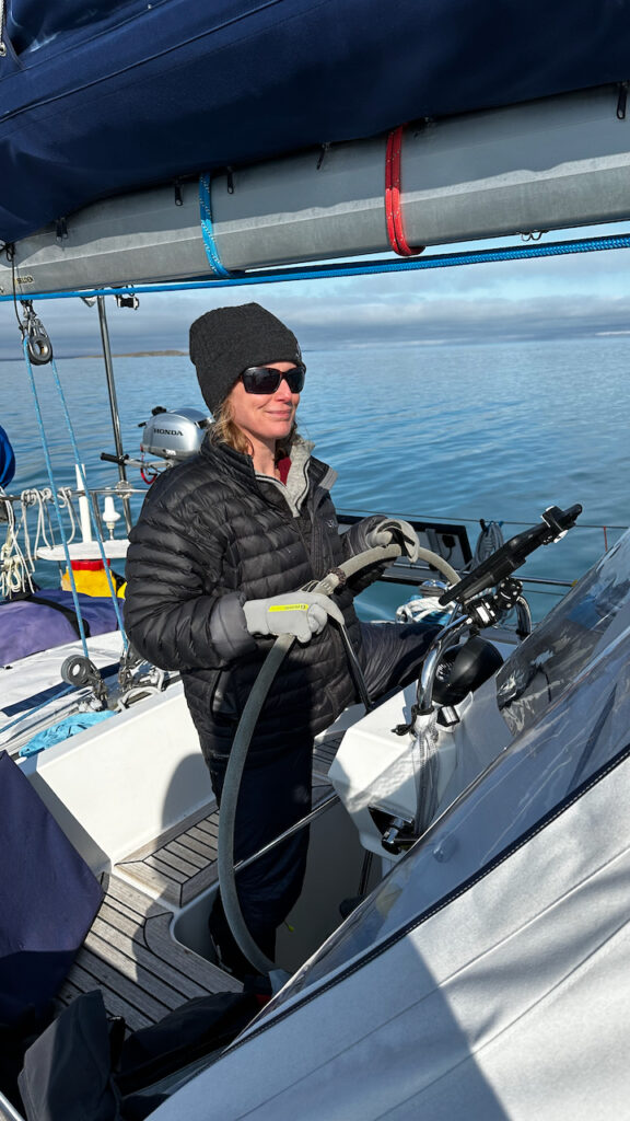 Sarah steering the boat