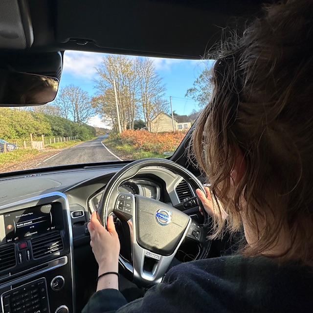 Sarah driving in the English side