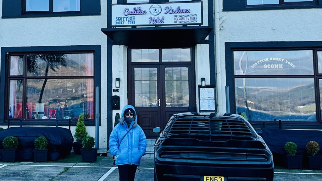 Picture of Sarah in front of american diner