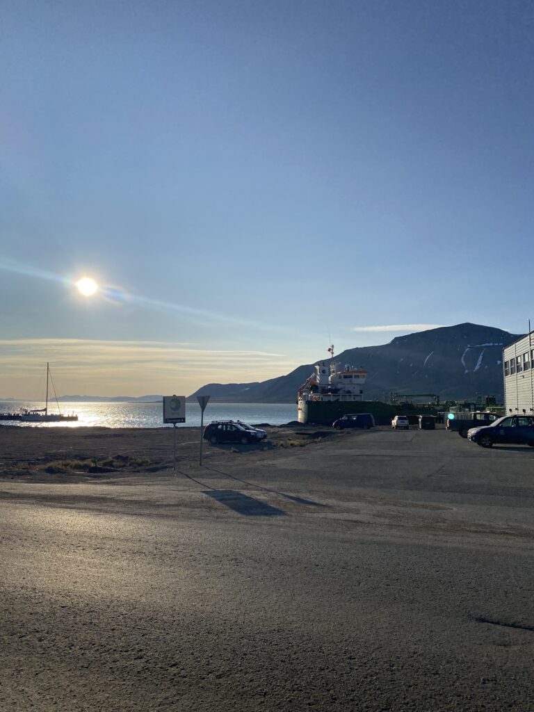 The sun over the harbour in Svalbard